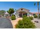 Stunning property featuring a covered entryway, mature landscaping, and neutral colors at 920 N 104Th St, Mesa, AZ 85207