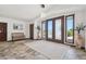 Bright foyer with decorative rug, bench seating, and an elegant glass door entry at 920 N 104Th St, Mesa, AZ 85207
