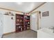 Functional mud room with built-in shelving, a sink, and convenient access to the outdoors at 920 N 104Th St, Mesa, AZ 85207