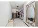 Spacious walk-in closet with custom shelving, bench and a large mirror for the ultimate wardrobe organization at 920 N 104Th St, Mesa, AZ 85207