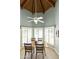Charming dining area with natural light, bay windows, and a ceiling fan at 9484 N 105Th Pl, Scottsdale, AZ 85258