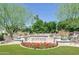 Beautiful community entrance with well-maintained landscaping, creating a welcoming and inviting atmosphere at 9484 N 105Th Pl, Scottsdale, AZ 85258