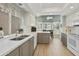Spacious kitchen featuring granite countertops, stainless steel appliances, and a breakfast nook at 9484 N 105Th Pl, Scottsdale, AZ 85258