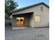 Back of home featuring a covered patio and a sliding glass door to bring the outside in at 10649 W Alvarado Rd, Avondale, AZ 85392