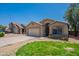 Charming single-Gathering home with a well-manicured lawn and desert landscaping in a suburban neighborhood at 10649 W Alvarado Rd, Avondale, AZ 85392