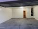 Spacious two-car garage with ample storage and access to the home's interior at 10649 W Alvarado Rd, Avondale, AZ 85392