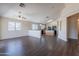 Open floor plan with a view into the kitchen creates a perfect space for entertaining guests at 10649 W Alvarado Rd, Avondale, AZ 85392