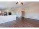 Spacious living room flows into the kitchen for an open and inviting atmosphere at 10649 W Alvarado Rd, Avondale, AZ 85392