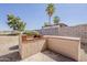 Backyard area featuring outdoor brick barbeque for outdoor cooking and entertaining at 11016 W Griswold Rd, Peoria, AZ 85345
