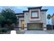 Charming two-story home with an attached garage and desert landscaping in a Gathering-friendly neighborhood at 11016 W Griswold Rd, Peoria, AZ 85345