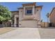 Attractive home with a well-maintained yard, ample parking, and desert landscaping at 11016 W Griswold Rd, Peoria, AZ 85345