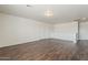 Bright and airy living room with hardwood floors and abundant natural light at 11016 W Griswold Rd, Peoria, AZ 85345