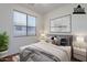 This bedroom is virtually staged with neutral paint, vinyl floors and window with mini blinds at 1244 S Tacoma --, Mesa, AZ 85209