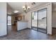 Dining space with tile flooring and direct access to kitchen and outdoor patio at 1244 S Tacoma --, Mesa, AZ 85209