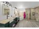 Bright bathroom showcasing double sinks, soaking tub, and a walk-in shower at 13631 N 70Th Dr, Peoria, AZ 85381