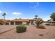 Charming home boasts a tile roof, three-car garage, and drought-tolerant landscaping at 13631 N 70Th Dr, Peoria, AZ 85381