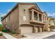 Exterior view of a two-story home with a three-car garage at 16620 S 48Th St # 79, Phoenix, AZ 85048