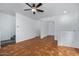 Spacious living room with arched doorways and neutral paint at 16620 S 48Th St # 79, Phoenix, AZ 85048