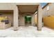 Covered patio with barbecue area, sliding glass doors, and concrete flooring at 16620 S 48Th St # 79, Phoenix, AZ 85048