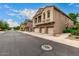 Street view of a neighborhood with two-story homes and three car garages at 16620 S 48Th St # 79, Phoenix, AZ 85048
