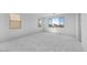 Spacious bedroom with plush gray carpet and abundant natural light from multiple windows at 16810 W Yucatan Dr, Surprise, AZ 85388