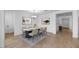 Elegant dining room with stylish decor, modern lighting, and an inviting atmosphere for memorable dining experiences at 16810 W Yucatan Dr, Surprise, AZ 85388