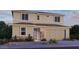 Two-story home showcasing neutral stucco, decorative stone accents and a two car garage at 16810 W Yucatan Dr, Surprise, AZ 85388