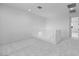 Upstairs landing with neutral carpet and white railing at 16810 W Yucatan Dr, Surprise, AZ 85388