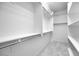 Spacious walk-in closet with ample shelving and storage space, perfect for organization at 16810 W Yucatan Dr, Surprise, AZ 85388