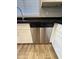 Close-up view of the stainless steel dishwasher, seamlessly integrated into the cabinetry at 1730 W Pollack St, Phoenix, AZ 85041