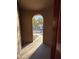 Arched entryway offers an intriguing glimpse into the home's design and layout at 1730 W Pollack St, Phoenix, AZ 85041