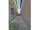 View between homes in the neighborhood highlighting low maintenance rock and stucco exteriors at 1730 W Pollack St, Phoenix, AZ 85041