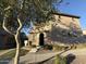 Inviting two-story home with a stone-accented entryway and well-maintained landscaping at 1730 W Pollack St, Phoenix, AZ 85041