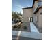 Charming home exterior with desert landscaping, a sidewalk pathway, and a glass-paneled front door at 1730 W Pollack St, Phoenix, AZ 85041