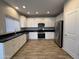 Bright kitchen with white cabinets, granite countertops, stainless steel appliances at 1730 W Pollack St, Phoenix, AZ 85041