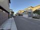 Neat and well-maintained streetscape, showing the garages and homes' exteriors in this neighborhood at 1730 W Pollack St, Phoenix, AZ 85041