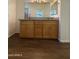 Bathroom boasts double sink vanity, tile floors, and ample mirror space for convenience at 1738 W Pollack St, Phoenix, AZ 85041