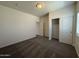 Cozy bedroom with plush carpeting and closet with white doors providing ample storage at 1738 W Pollack St, Phoenix, AZ 85041