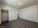 Bright bedroom with carpet floors and closet with white doors at 1738 W Pollack St, Phoenix, AZ 85041
