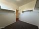 Bright and spacious closet features adjustable shelves and sturdy hanging rods for optimal organization at 1738 W Pollack St, Phoenix, AZ 85041