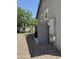 Side exterior view of house with rocks, windows, and exterior electrical features at 1738 W Pollack St, Phoenix, AZ 85041