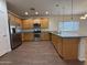 Well-equipped kitchen with stainless steel appliances, granite countertops, and ample cabinet space at 1738 W Pollack St, Phoenix, AZ 85041