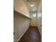 Functional laundry room with shelving and tiled floor at 1738 W Pollack St, Phoenix, AZ 85041