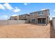 Unlandscaped backyard features block wall fencing and covered patio at 17615 W Palo Verde Dr, Litchfield Park, AZ 85340