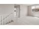 Bright, carpeted loft area with natural light at 17615 W Palo Verde Dr, Litchfield Park, AZ 85340