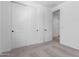 Bedroom with carpet, closet and door, and a clean, minimalist design at 18486 E Dario Rd, Gold Canyon, AZ 85118