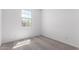 Bedroom featuring neutral carpet and a window offering natural light at 18486 E Dario Rd, Gold Canyon, AZ 85118