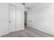 Bedroom with carpet flooring, closet and door, creating a cozy atmosphere at 18486 E Dario Rd, Gold Canyon, AZ 85118