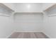 Spacious walk-in closet with ample shelving and hanging space at 18486 E Dario Rd, Gold Canyon, AZ 85118