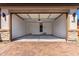 Spacious two-car garage with an automatic door and ample room for parking and storage at 18486 E Dario Rd, Gold Canyon, AZ 85118